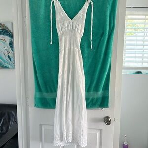 100% cotton sundress brand new. Stretchy halter top w lace bottom calf length.